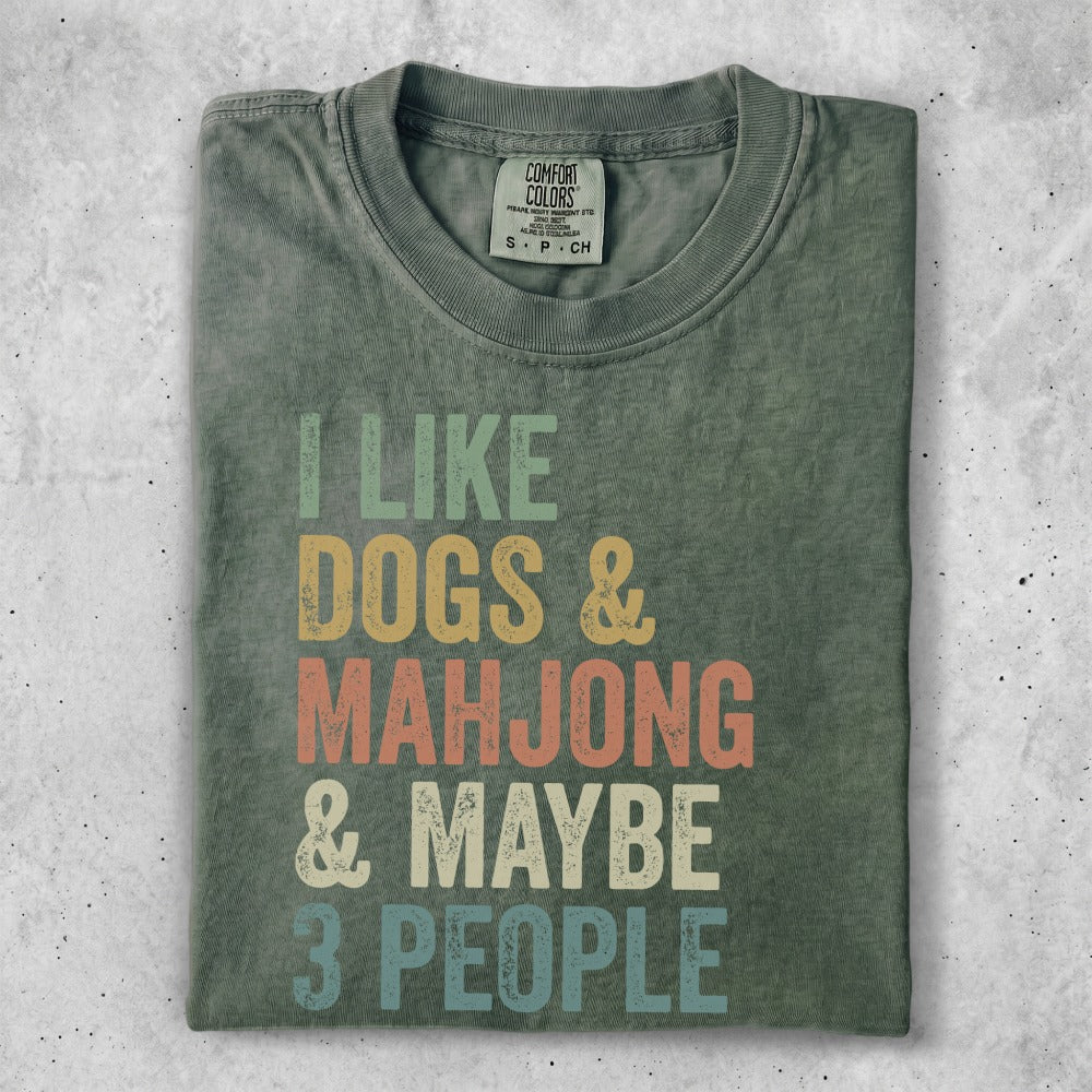 Green t-shirt with "I LIKE DOGS & MAHJONG & MAYBE 3 PEOPLE" in block letters.