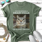 Green t-shirt with cat face and text "You're Either A Smart Fella Or A Fart Smella".