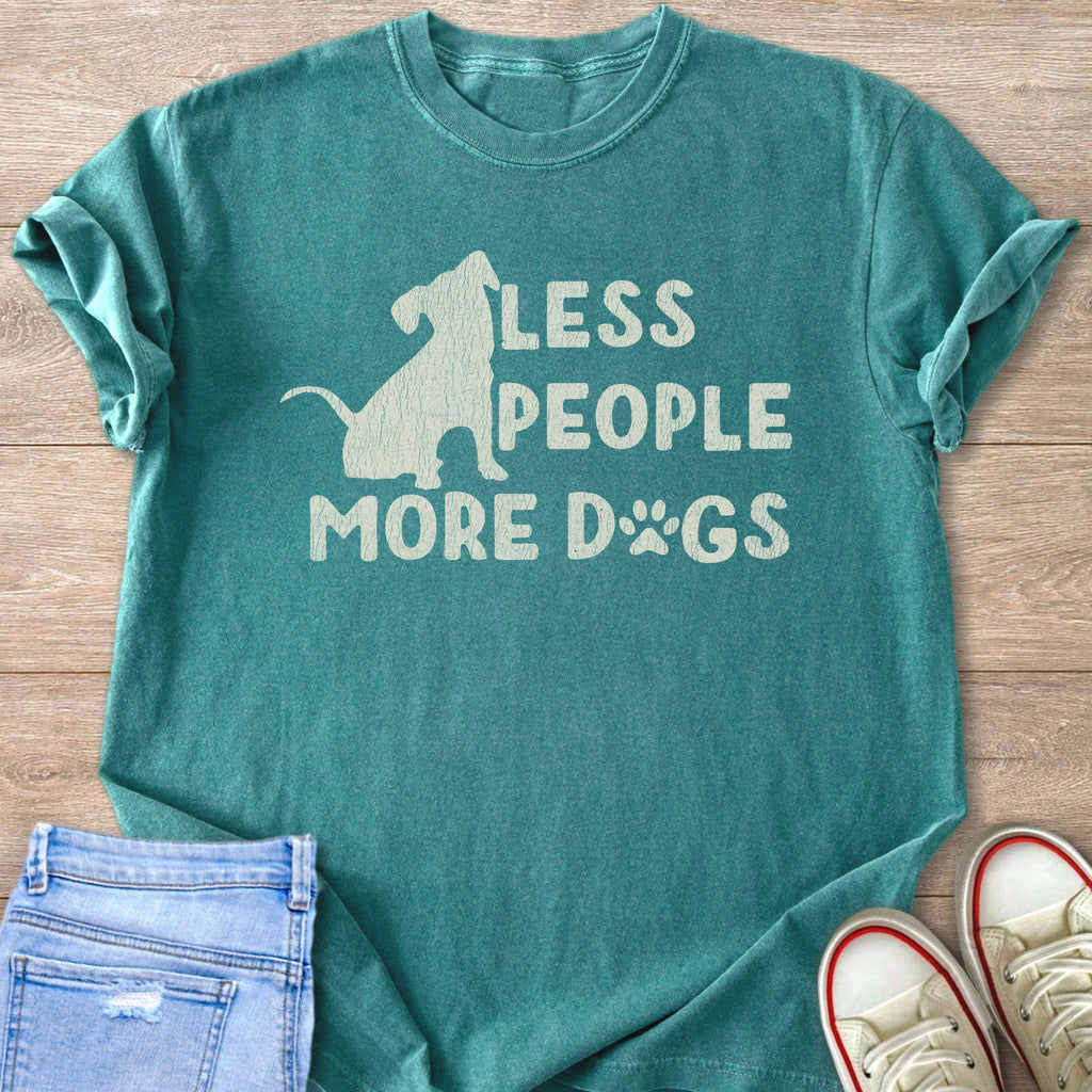 Teal t-shirt with white text and dog silhouette saying "Less People More Dogs".