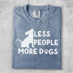 Blue t-shirt with white text "LESS PEOPLE MORE DOGS" and a dog silhouette.
