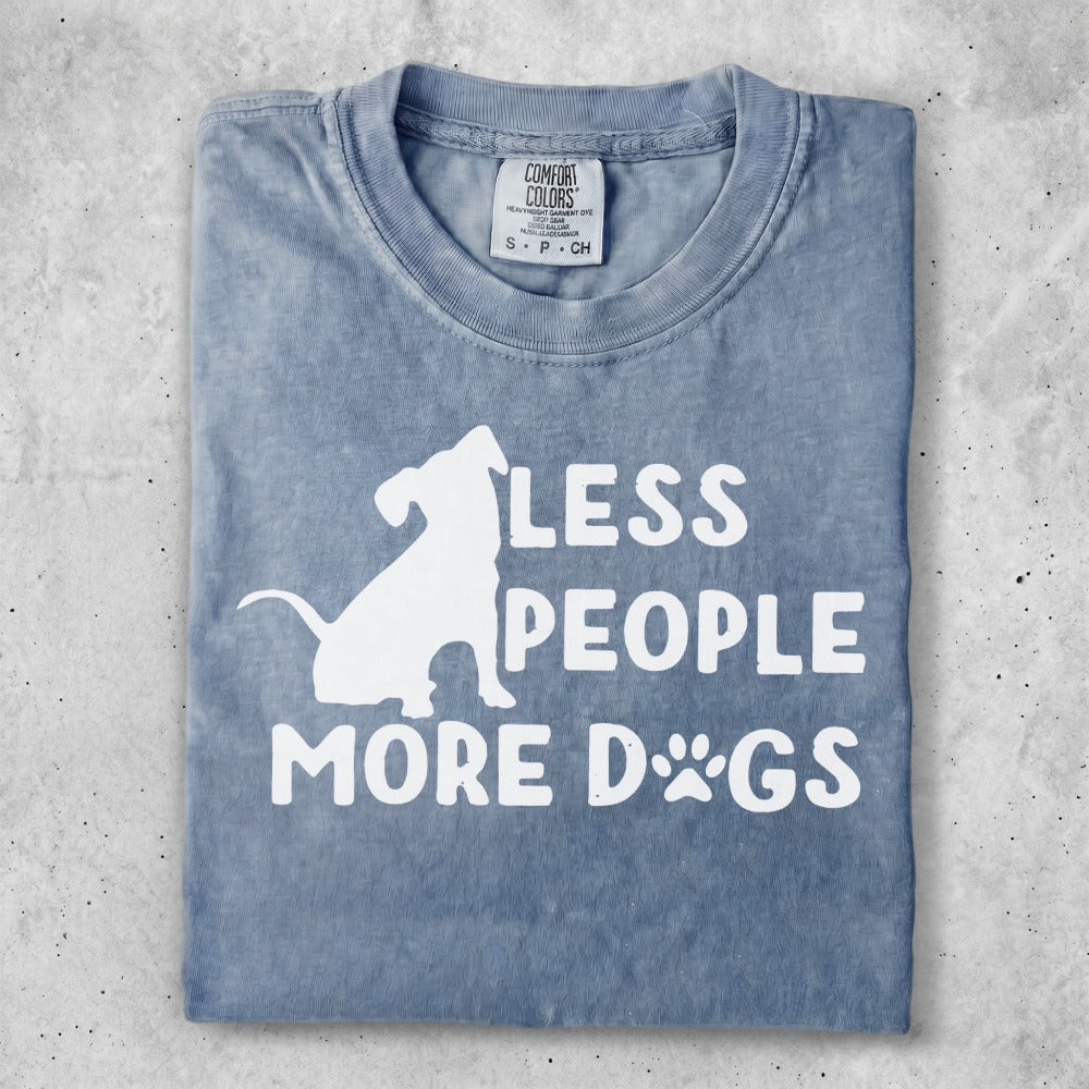 Blue t-shirt with white text "LESS PEOPLE MORE DOGS" and a dog silhouette.