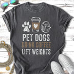 T-shirt with text "Pet Dogs Drink Coffee Lift Weights" and graphics.