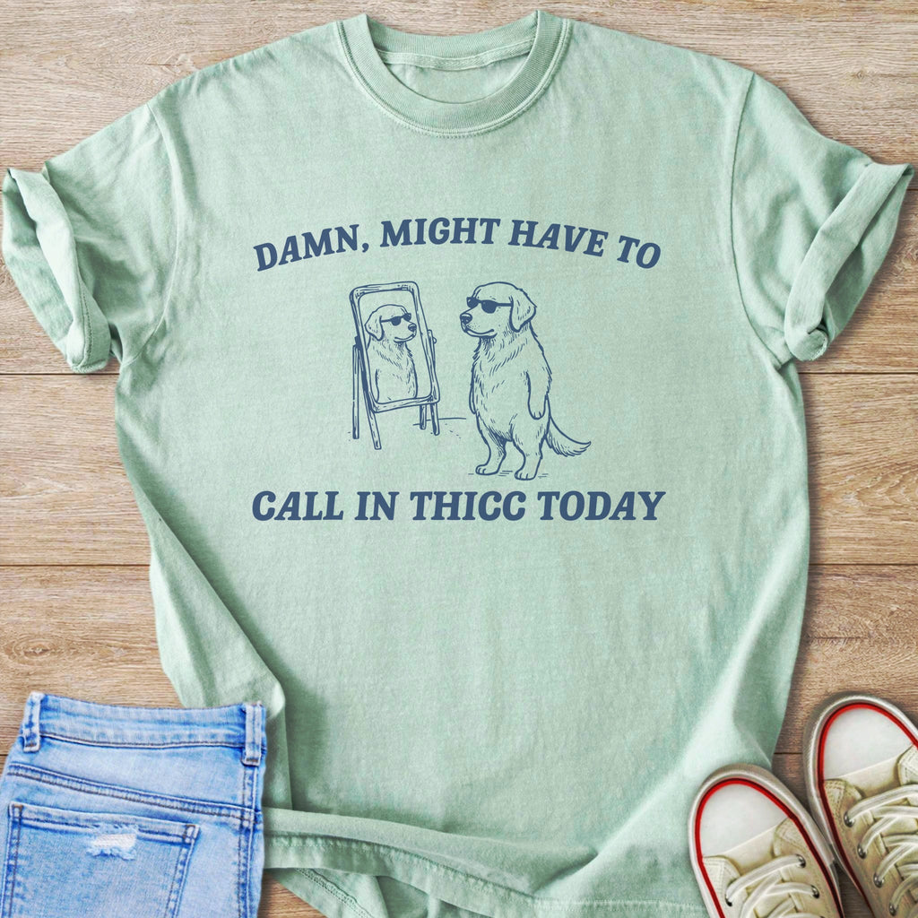 Dog in sunglasses checking reflection on mirror with text "CALL IN THICC TODAY".