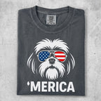 T-shirt with a patriotic Shih Tzu wearing sunglasses with the American flag pattern.