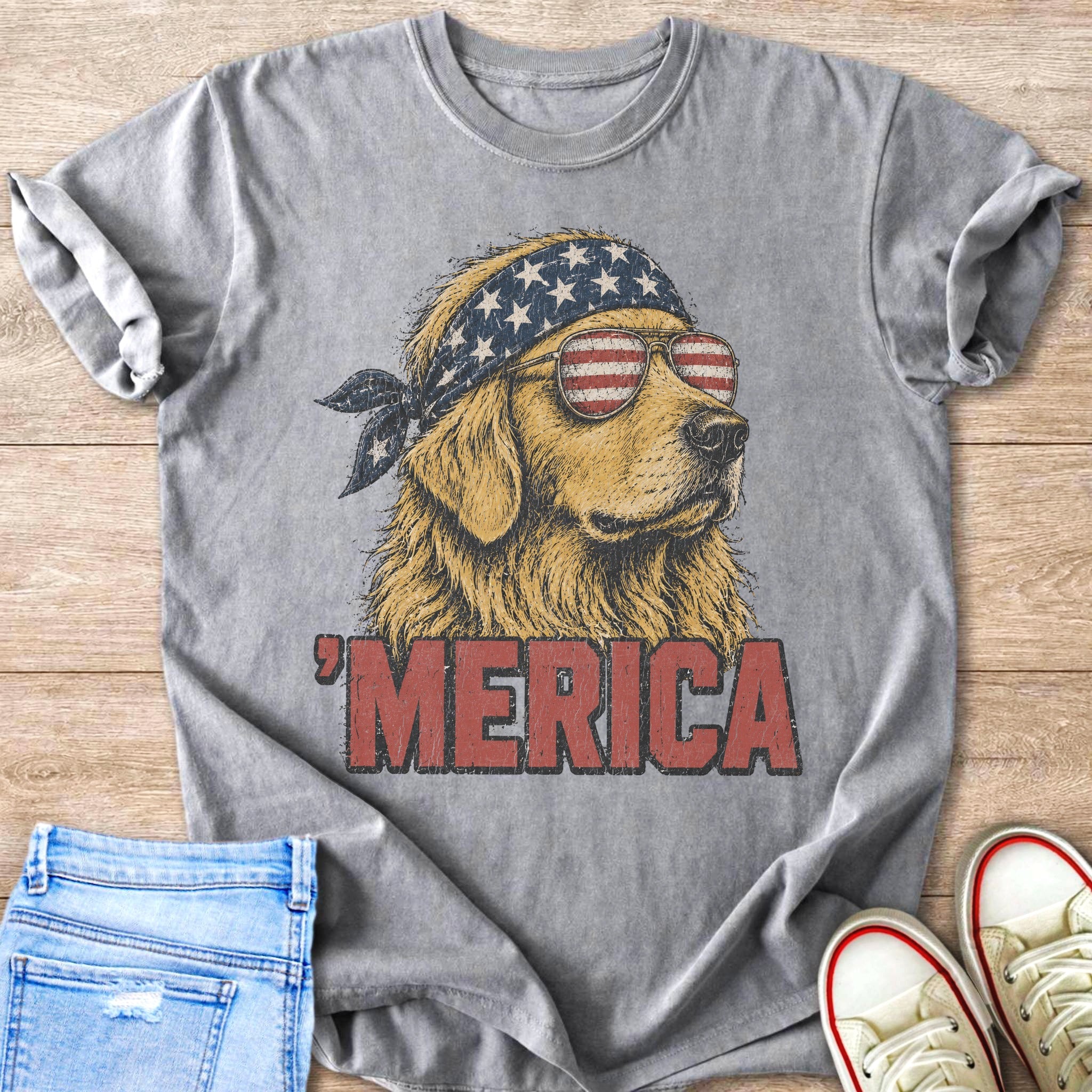 Dog wearing American flag bandana and sunglasses, text "'MERICA" on shirt.