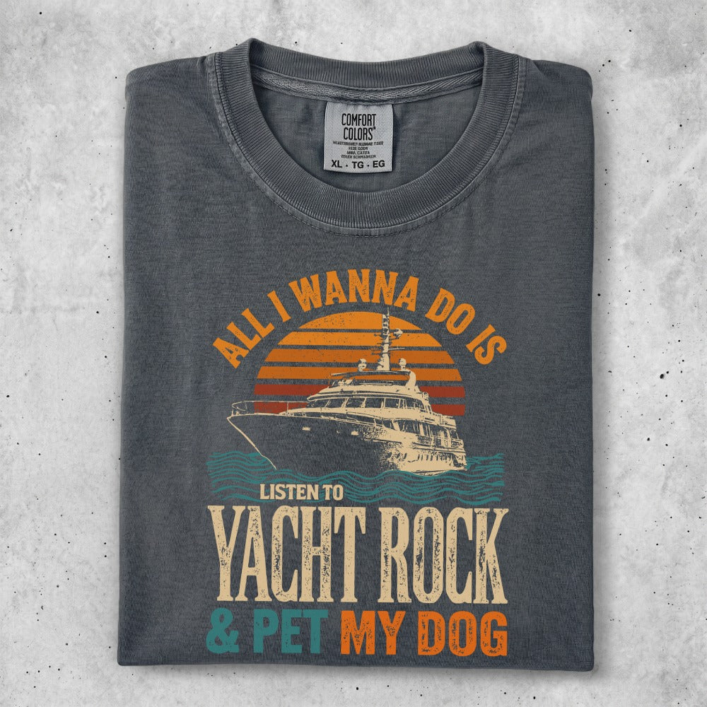 T-shirt with "All I Wanna Do Is Listen To Yacht Rock & Pet My Dog" text and a yacht graphic.