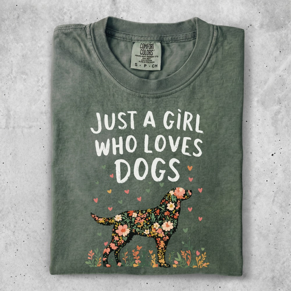 Green t-shirt with floral dog illustration and "Just a girl who loves dogs" text.