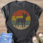 Chihuahua silhouette on vintage sunset graphic t-shirt.