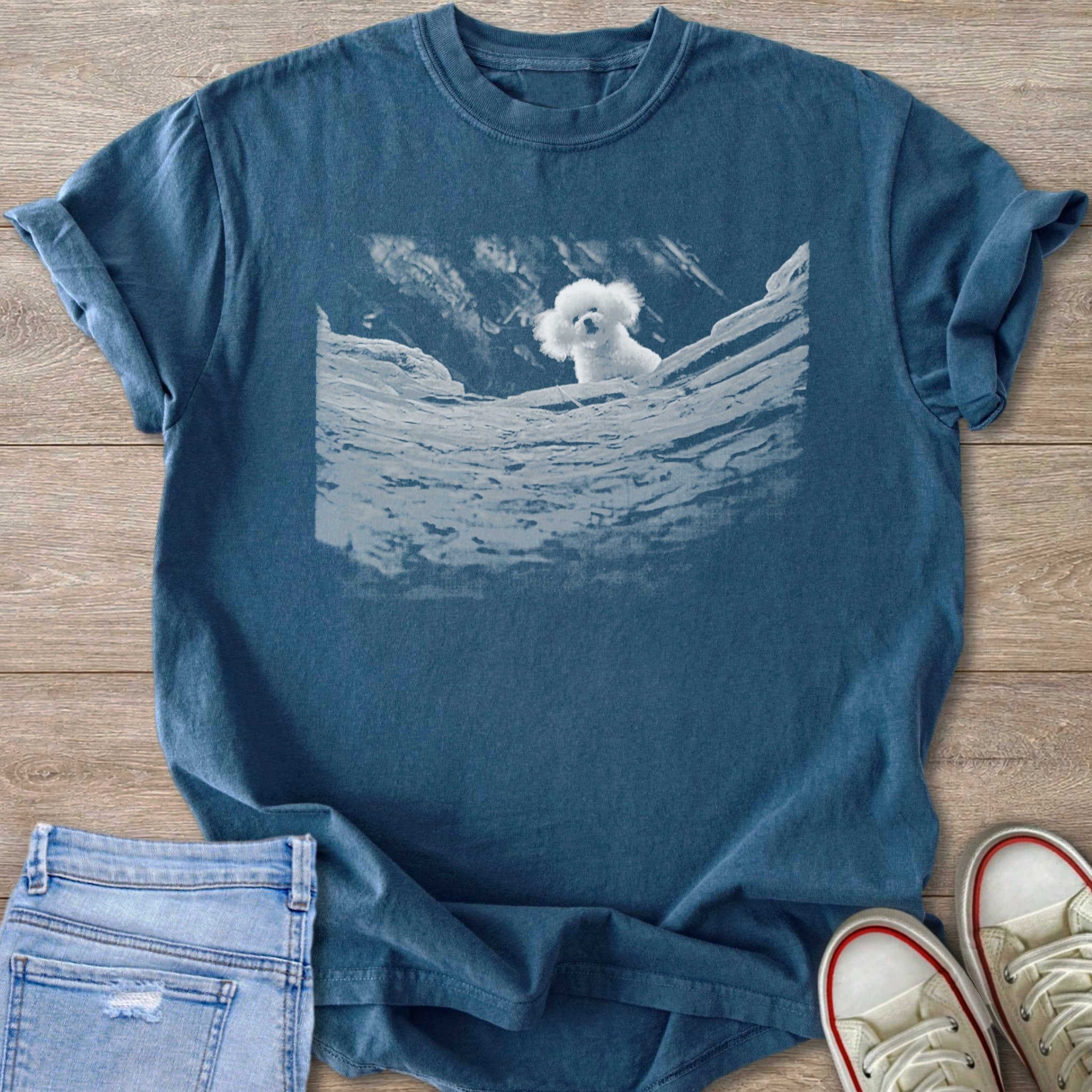 Blue Jean Comfort Colors 1717 t-shirt with a fluffy white dog peeking over rocks silence of the lambs graphic.