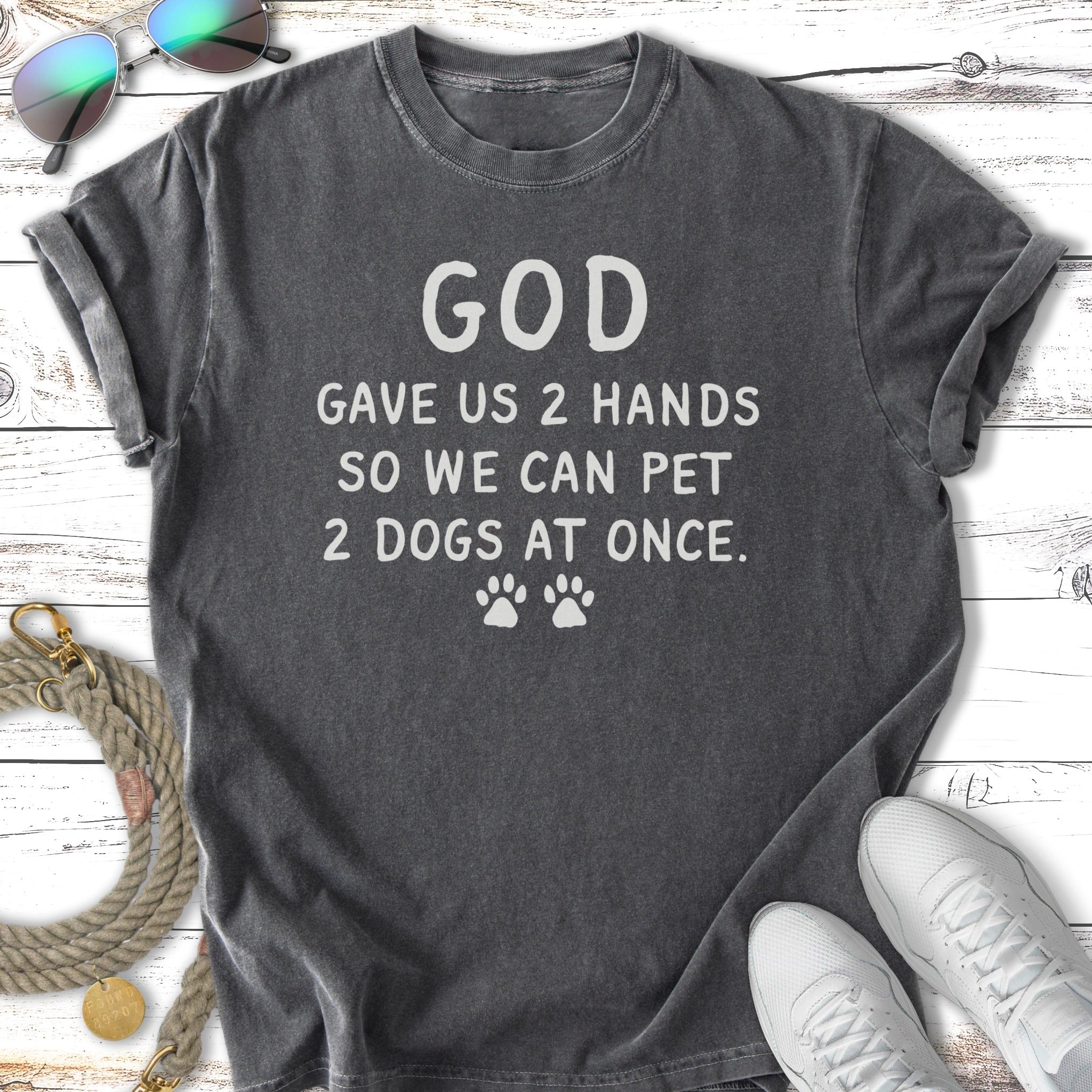Dark gray t-shirt with "God gave us 2 hands so we can pet 2 dogs at once" text.