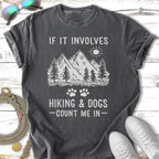 Black t-shirt with "If it involves hiking & dogs count me in" and mountain graphic.