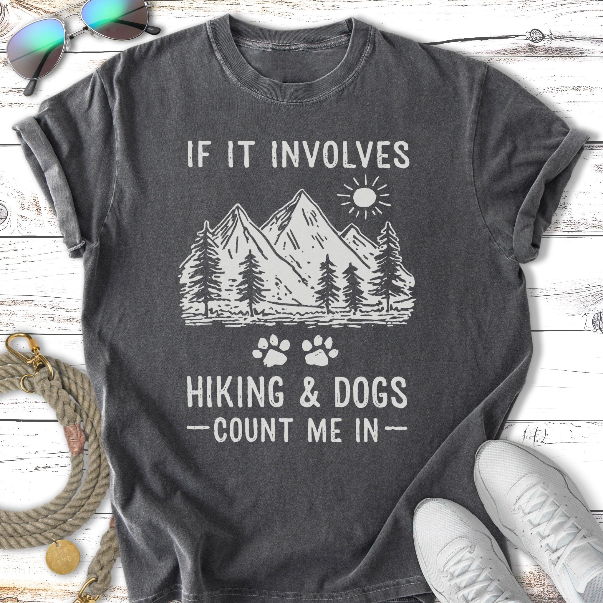 Black t-shirt with "If it involves hiking & dogs count me in" and mountain graphic.