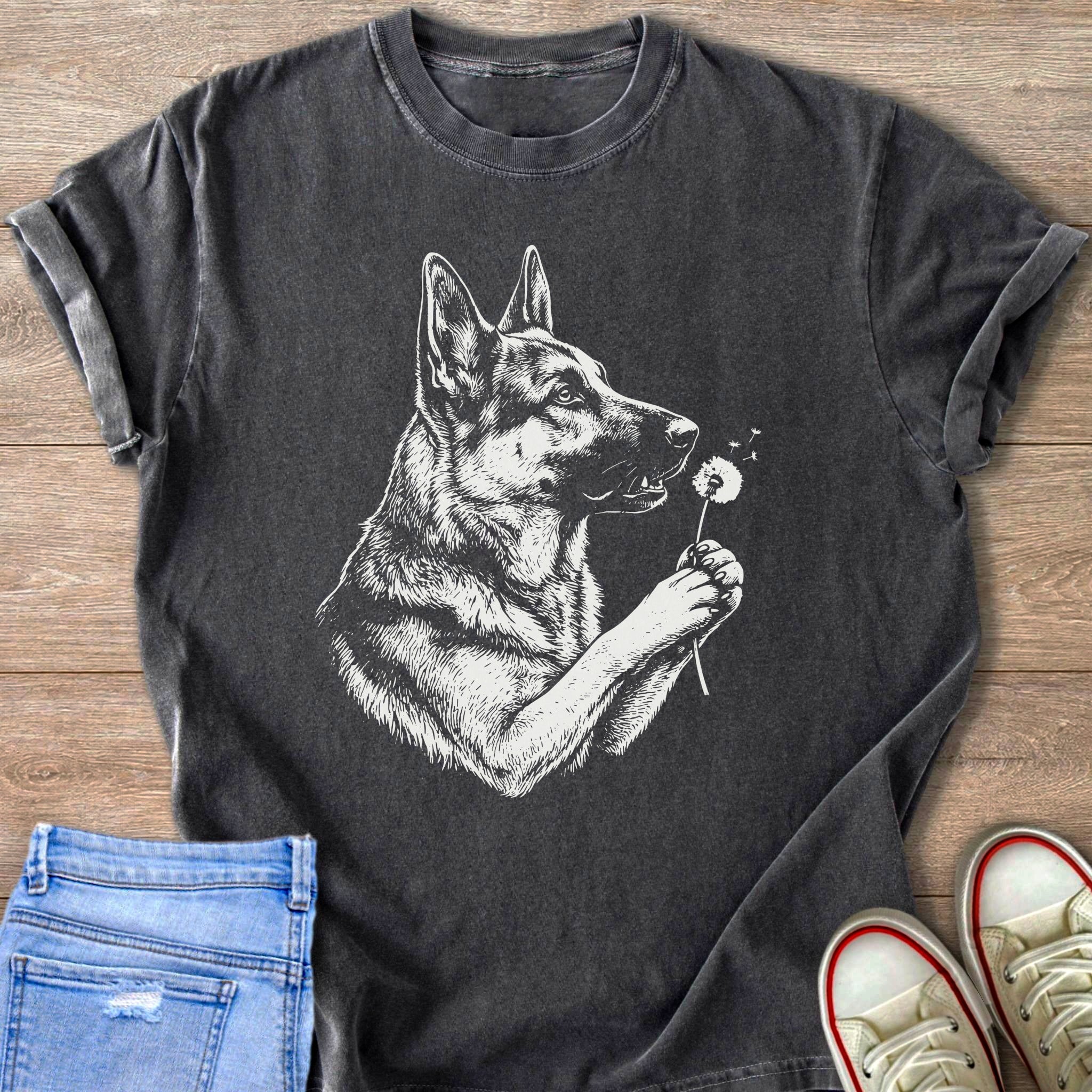 Dark grey t-shirt with a white graphic of a German Shepherd holding a dandelion.