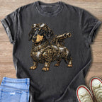 Steampunk dachshund with goggles and brass armor on a dark grey t-shirt.