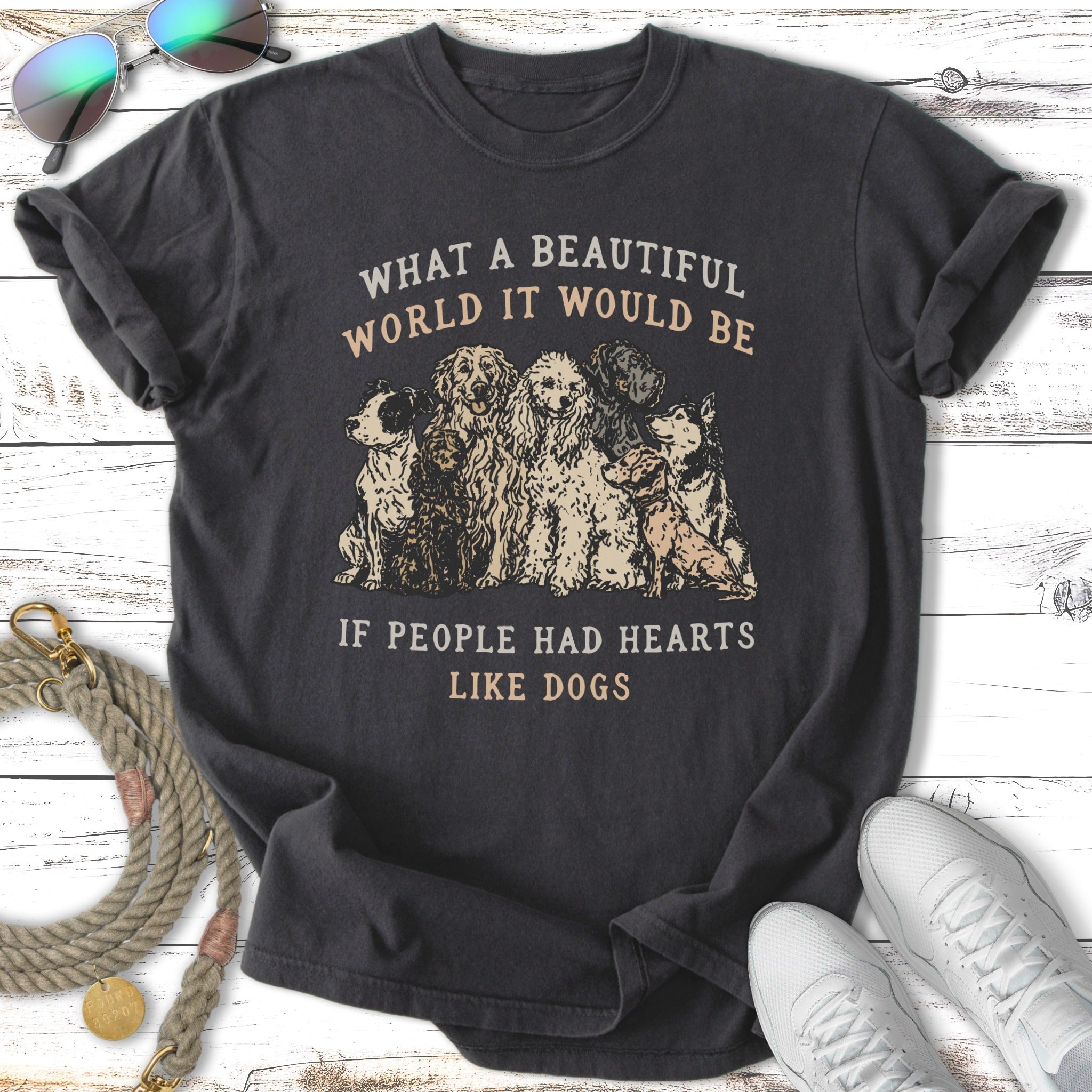 T-shirt with graphic of dogs and text "WHAT A BEAUTIFUL WORLD IT WOULD BE IF PEOPLE HAD HEARTS LIKE DOGS".