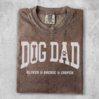 Brown t-shirt with "Dog Dad" and paw print graphic.