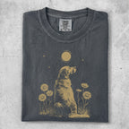 Golden Retriever sitting in a field of daisies with a moon above.