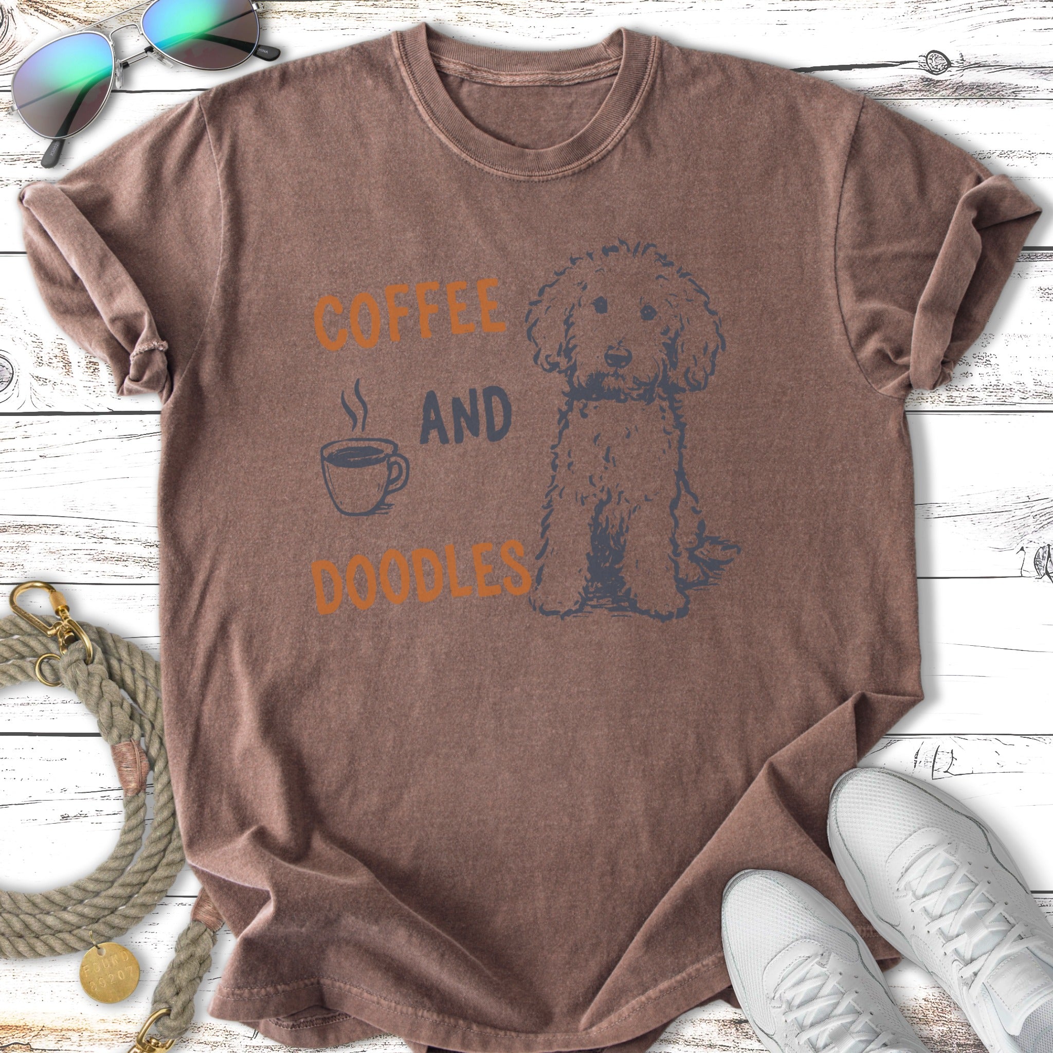 T-shirt with "Coffee and Doodles" text and a doodle dog illustration.
