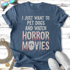 T-shirt with "I JUST WANT TO PET DOGS AND WATCH HORROR MOVIES" text and Jason mask.