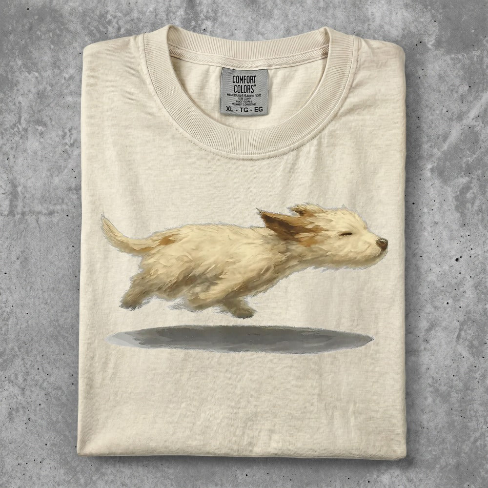 Cream t-shirt with a running golden puppy illustration.
