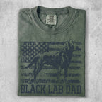 Green t-shirt with distressed American flag and black lab silhouette, text reads "BLACK LAB DAD".