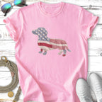 Pink t-shirt with a dachshund graphic featuring American flag fabric patterns.