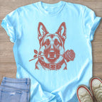 Light blue t-shirt with a graphic of a German Shepherd holding a rose in its mouth.