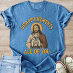 Jesus holds a French bulldog with text "Disappointments All of You."