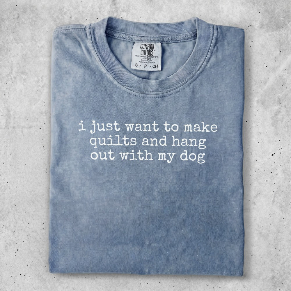 Blue t-shirt with white text "i just want to make quilts and hang out with my dog".