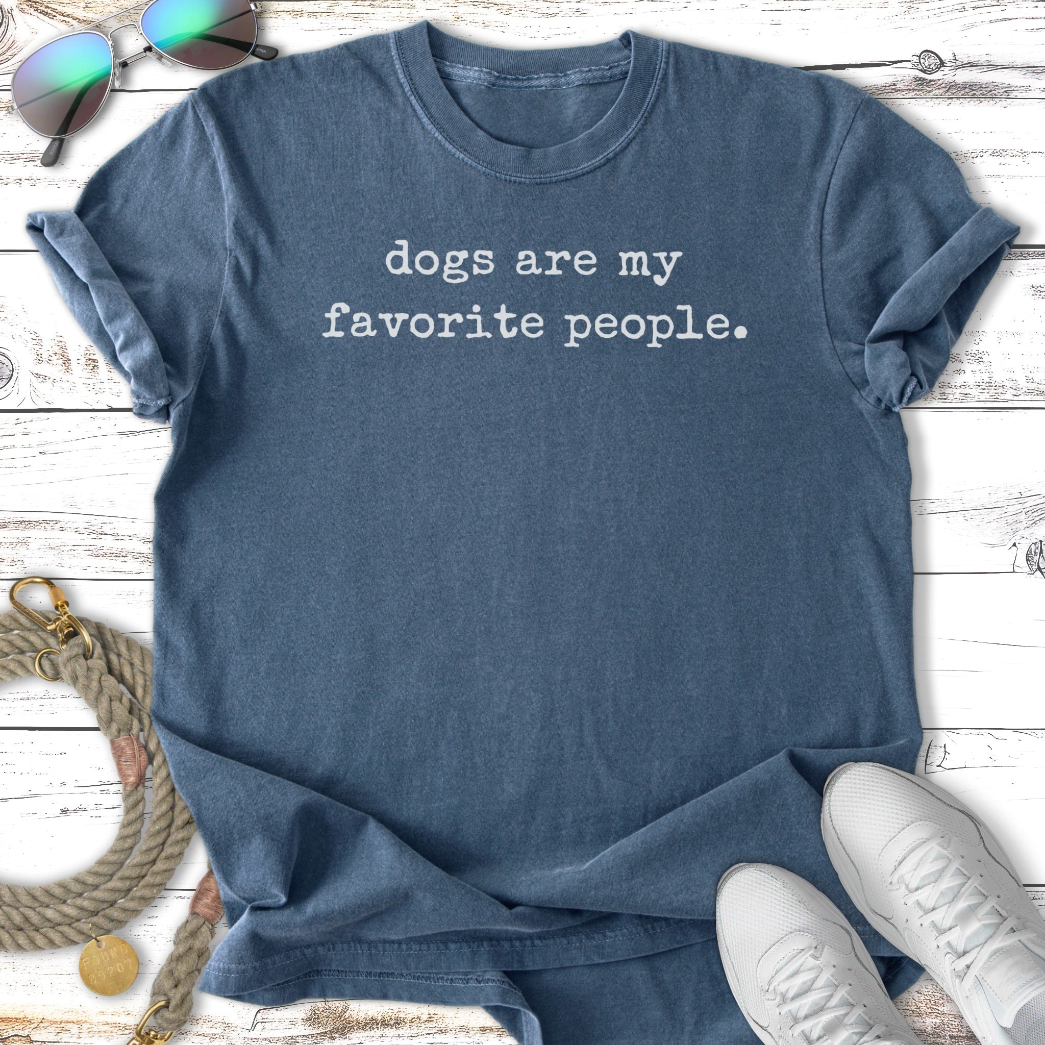 Blue t-shirt with white text: "dogs are my favorite people."
