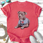 Gray pit bull wearing a blue "I ❤️ MOM" shirt.