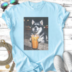 Husky wearing sunglasses holds a cold brew coffee drink.