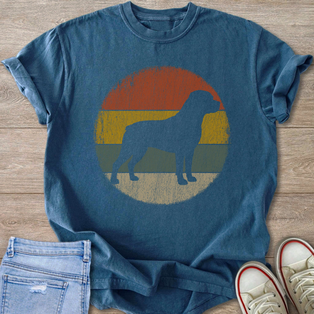 Blue t-shirt with retro dog silhouette on striped circle background.