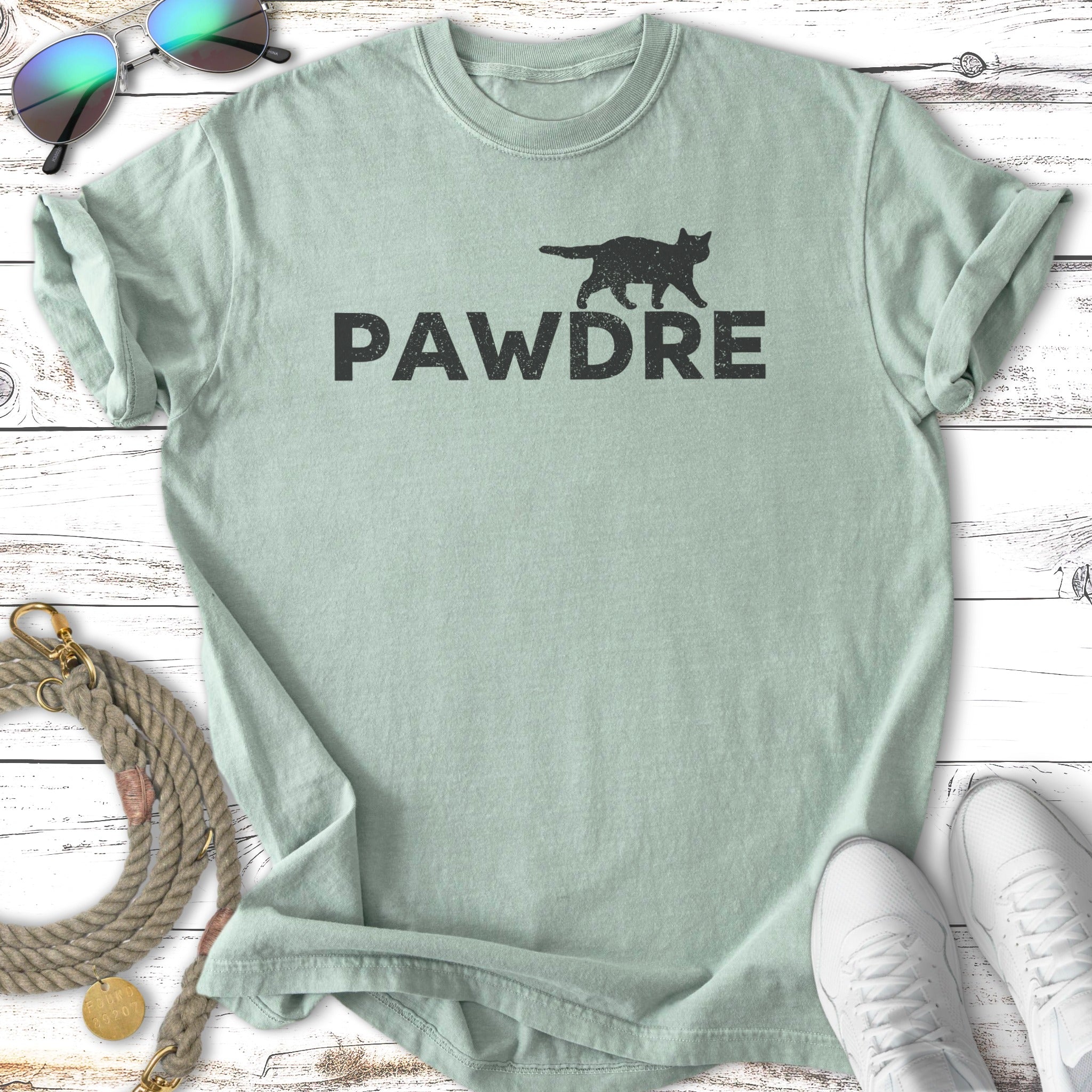 Light green t-shirt with black "PAWDRE" text and a black cat silhouette.