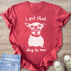 Red t-shirt with a distressed white print of a chihuahua and text "i got that dog in me".