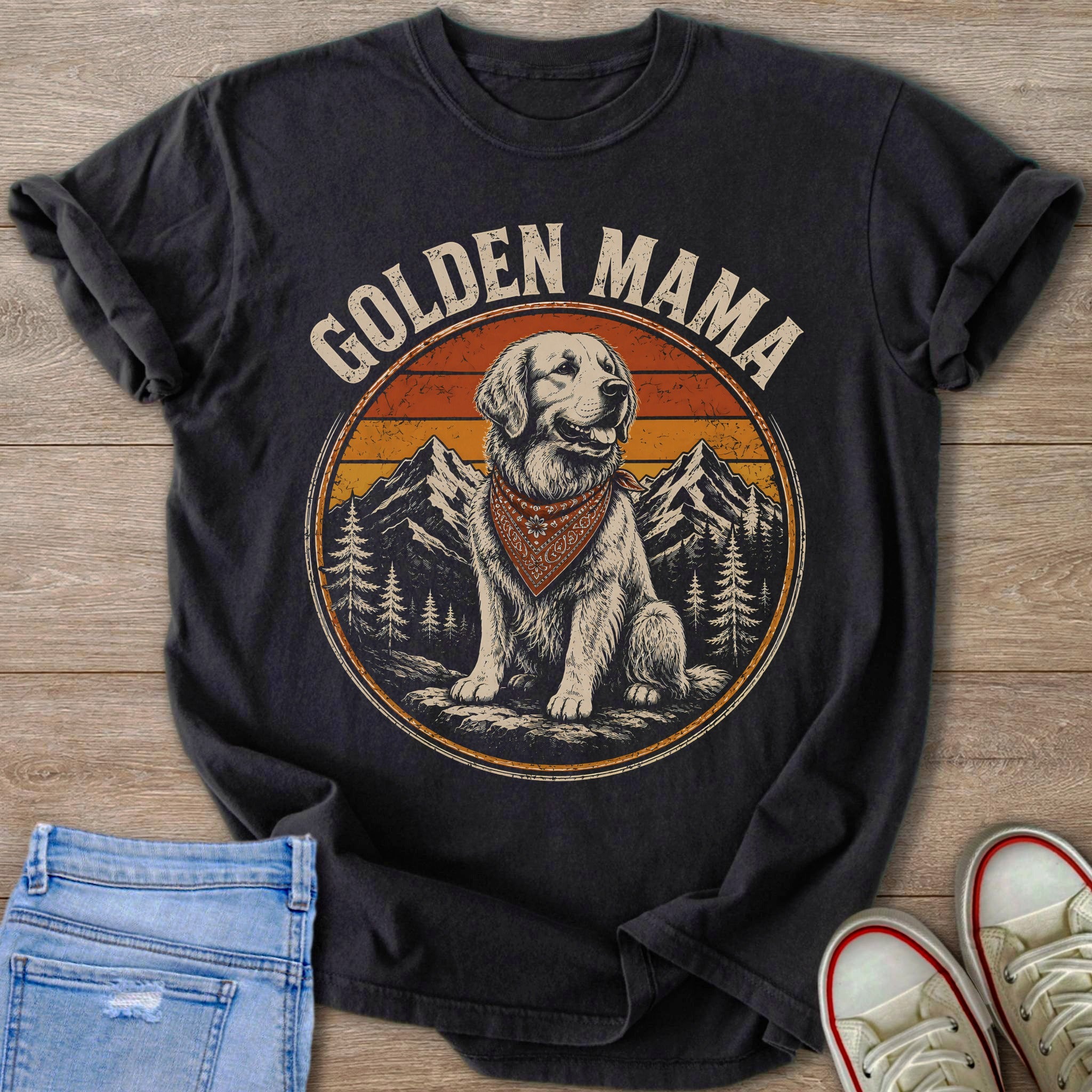 Golden Mama text above a seated golden retriever wearing a bandana in a circular mountain scene.