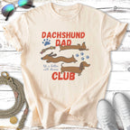 Dachshund Dad Club t-shirt with dachshund graphics and paw prints.