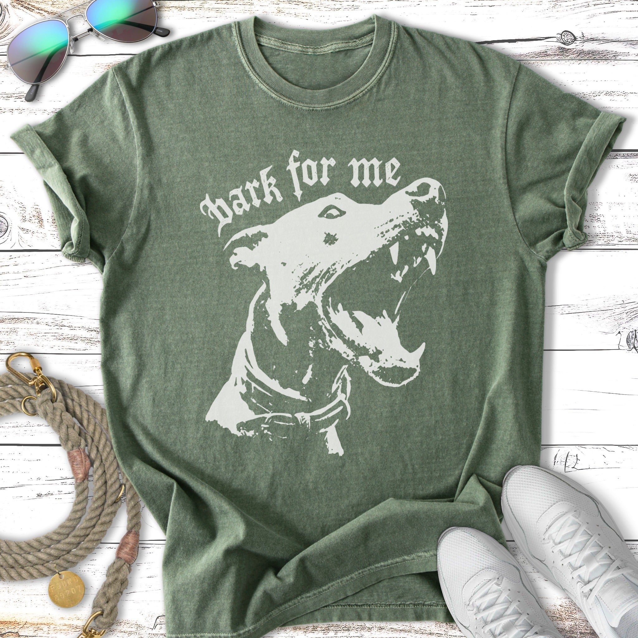 Green t-shirt with distressed white graphic of a dog's head and "Bark for me" text.