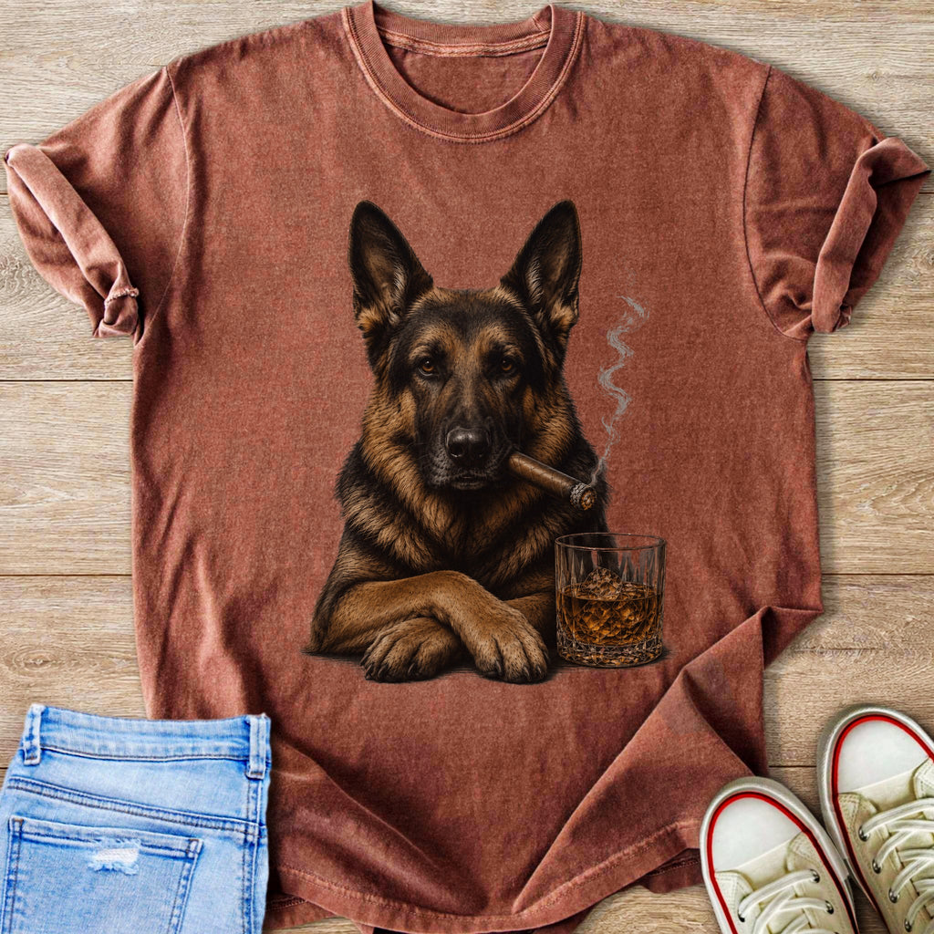 German Shepherd with cigar and whiskey on a maroon t-shirt.