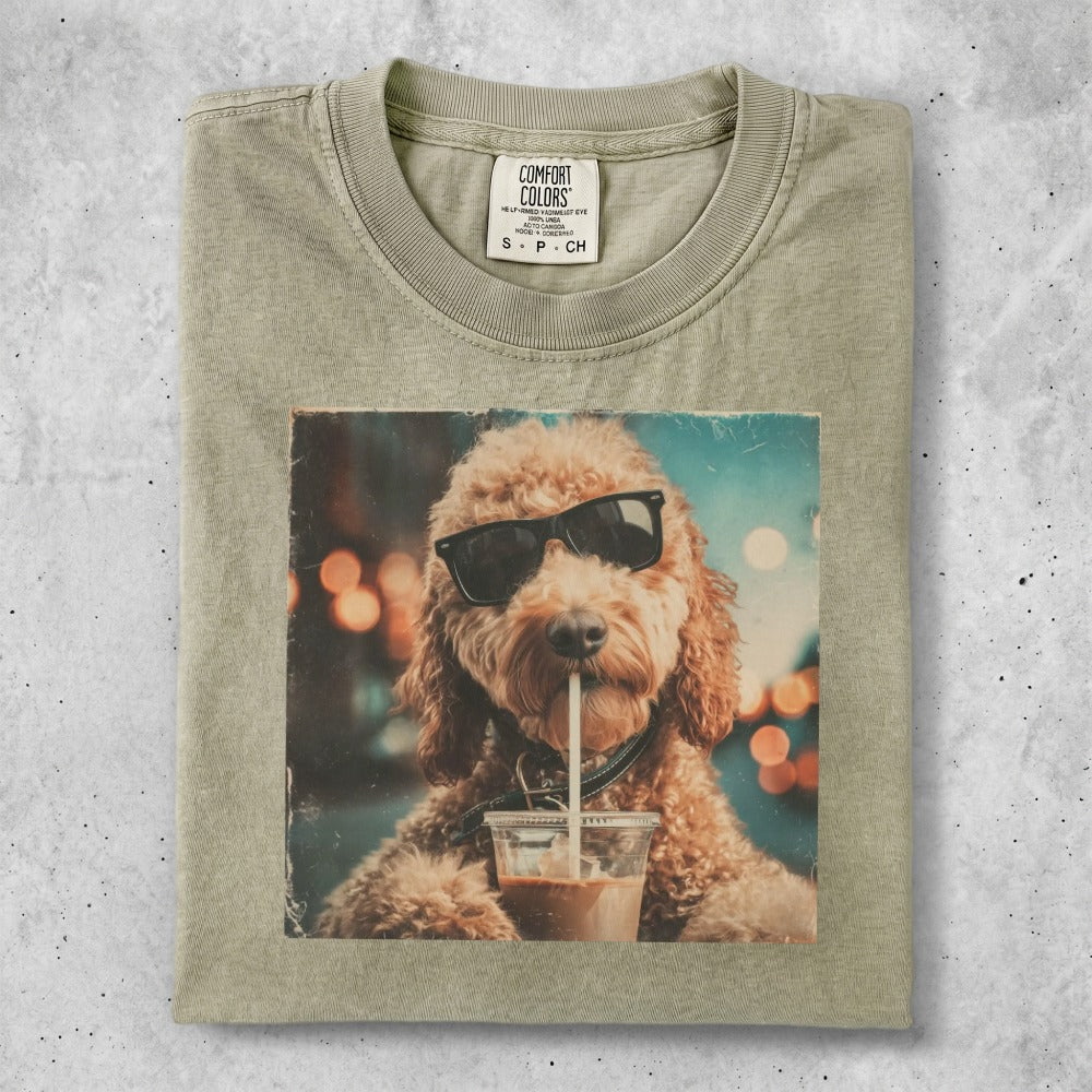 T-shirt with graphic of a poodle wearing sunglasses holding a drink.