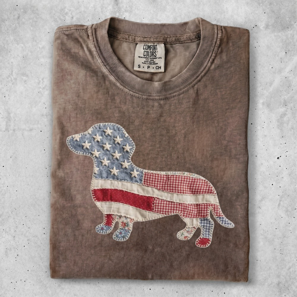 T-shirt featuring a dachshund silhouette filled with American flag patchwork.