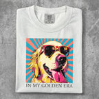 White t-shirt with golden retriever wearing sunglasses and "IN MY GOLDEN ERA" text.