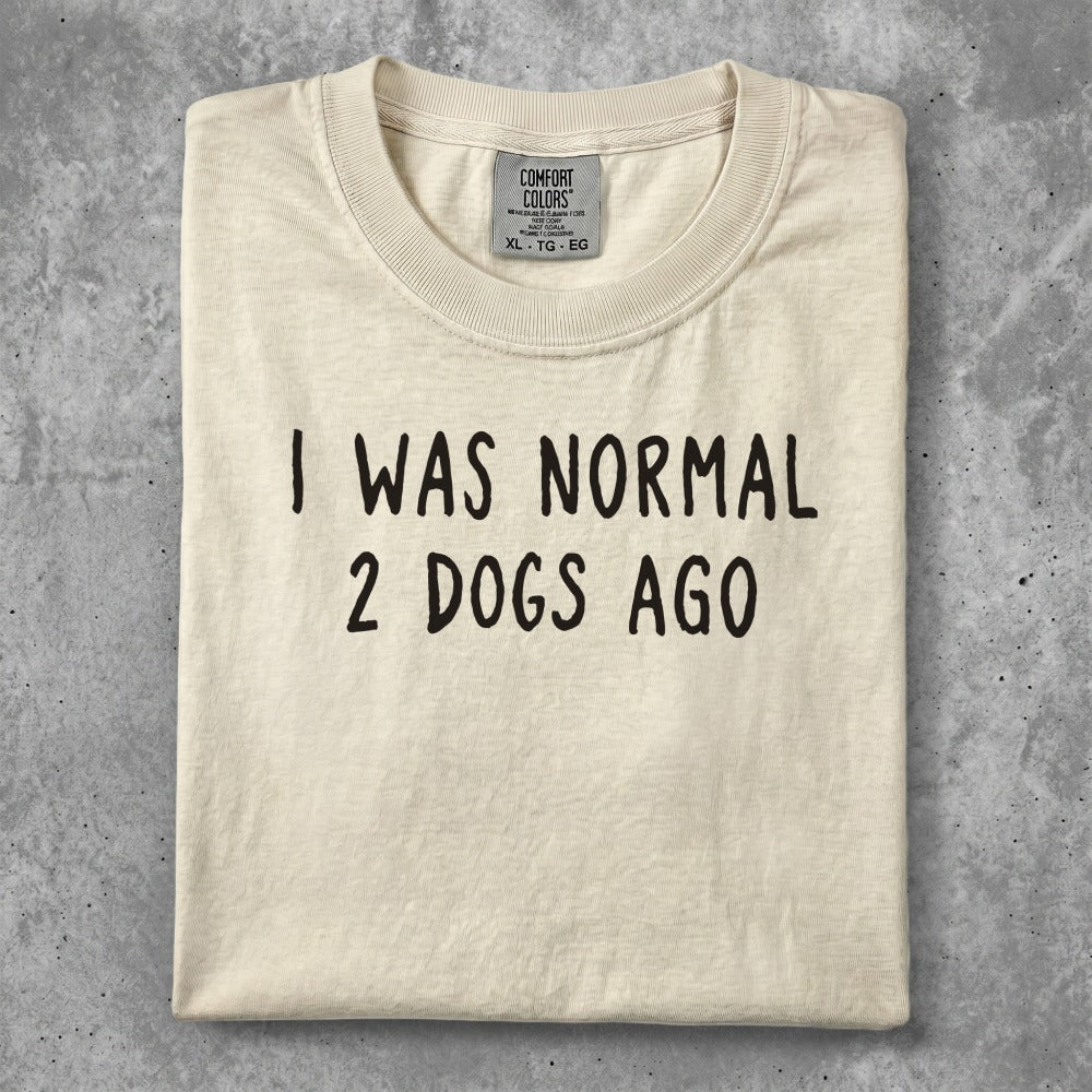 Cream t-shirt with "I WAS NORMAL 2 DOGS AGO" text.