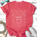 Red t-shirt with outline drawings of woodland animals and the text "respect the locals".
