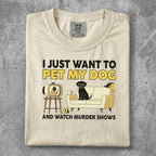T-shirt with dog, couch, TV, and text "I just want to pet my dog and watch murder shows."