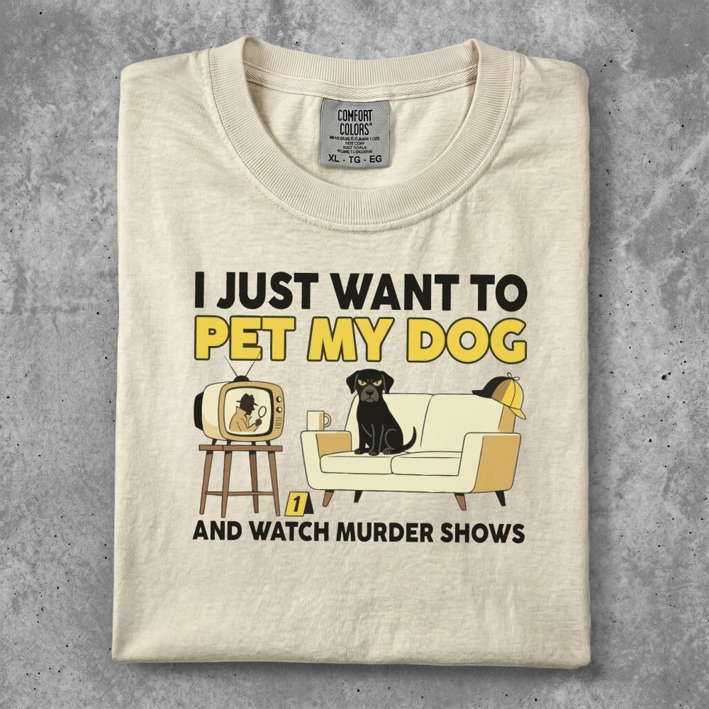 T-shirt with dog, couch, TV, and text "I just want to pet my dog and watch murder shows."