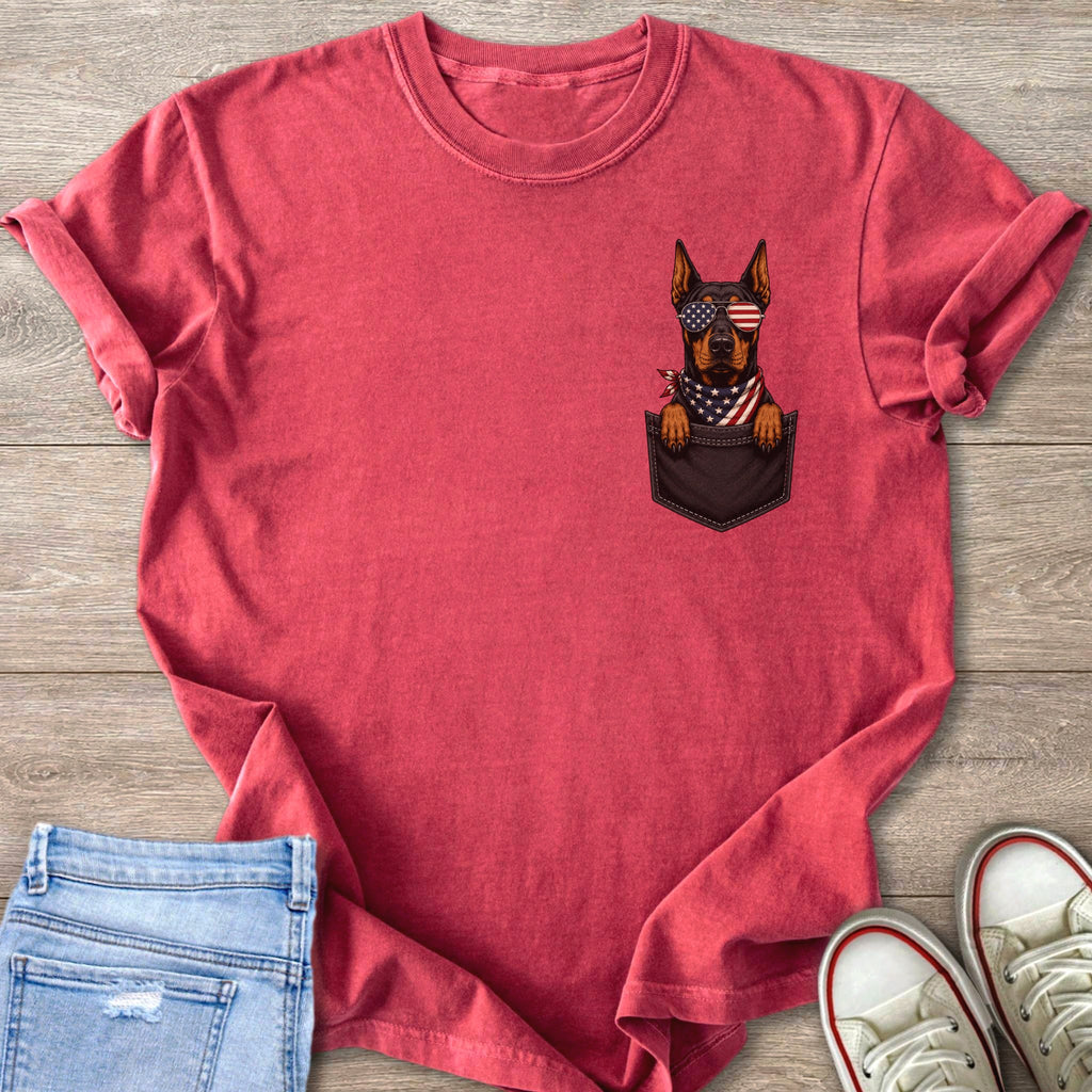 Red t-shirt with a dog wearing patriotic sunglasses and bandana in an embroidered pocket.