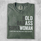 Green t-shirt with "BOLD BADASS SUPERWOMAN ...and I like my dog more than people" text.