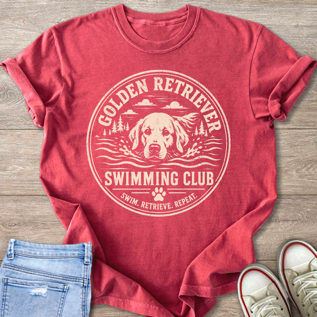 Red t-shirt with a Golden Retriever swimming graphic and "SWIM. RETRIEVE. REPEAT." text.