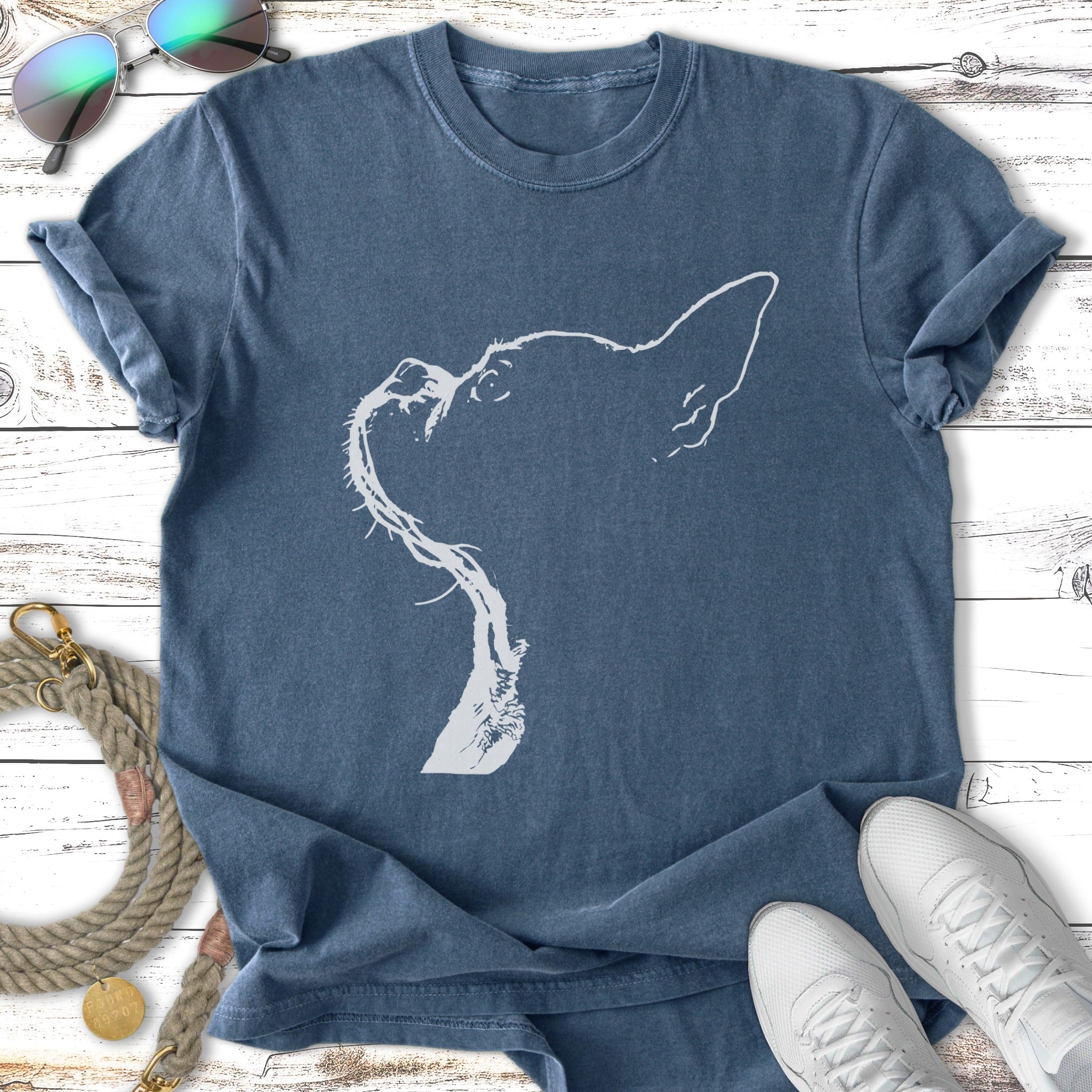 T-shirt with a white line drawing of a dog's head and long tongue.